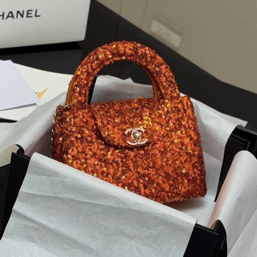 شنطة شانيل كوكو سيكوينز كيلي - CHANEL  اورنج
