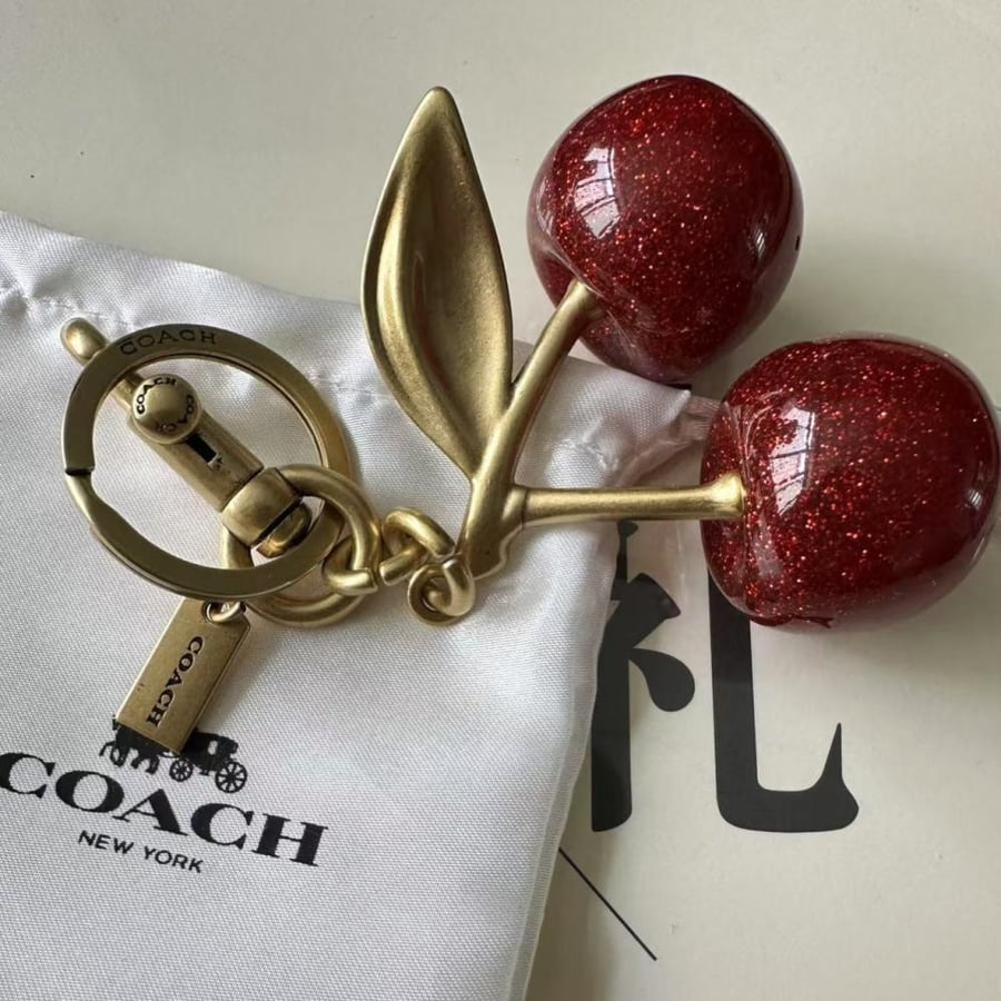 coach   ( تعليقة كوتش كرز )