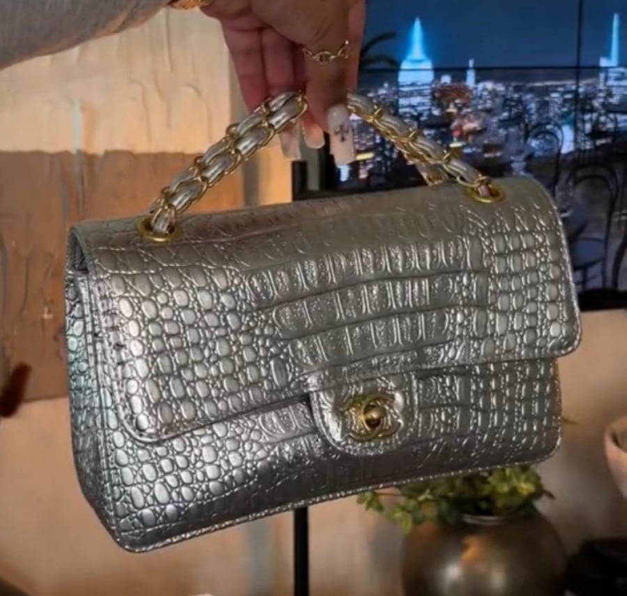 Chanel silver snakeskin flap