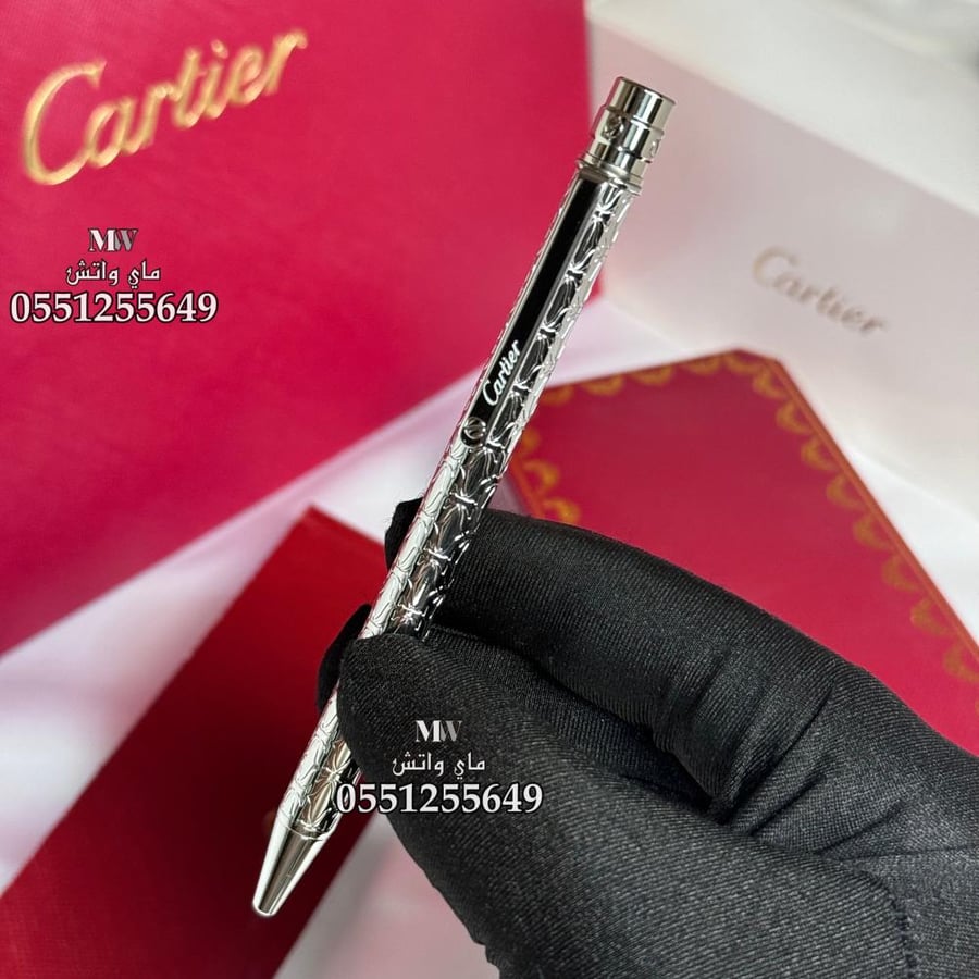 Cartier pen and Santos cup