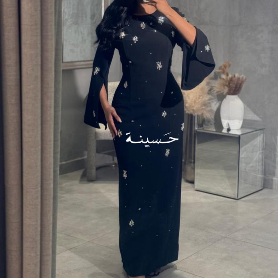 فستان أسود ناعم بالتطريز الفضي