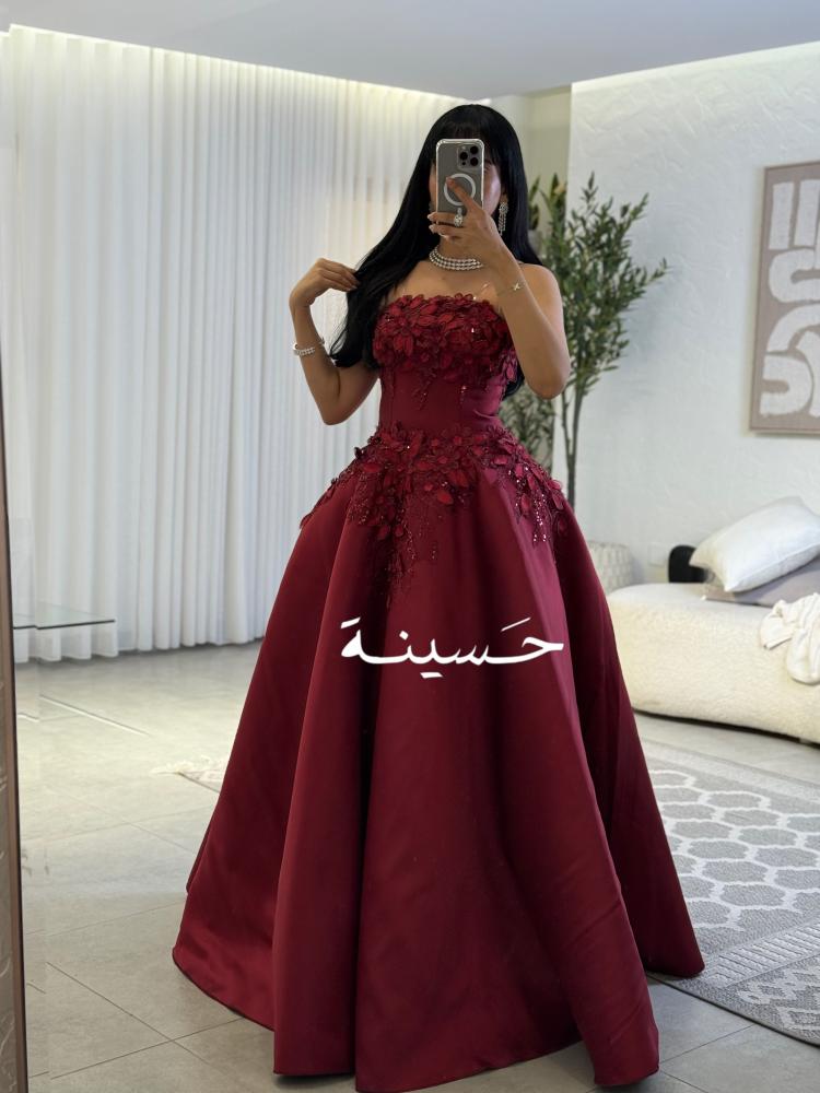 فستان سهرة كورسيه مزين بورود في الصدر و الخصر