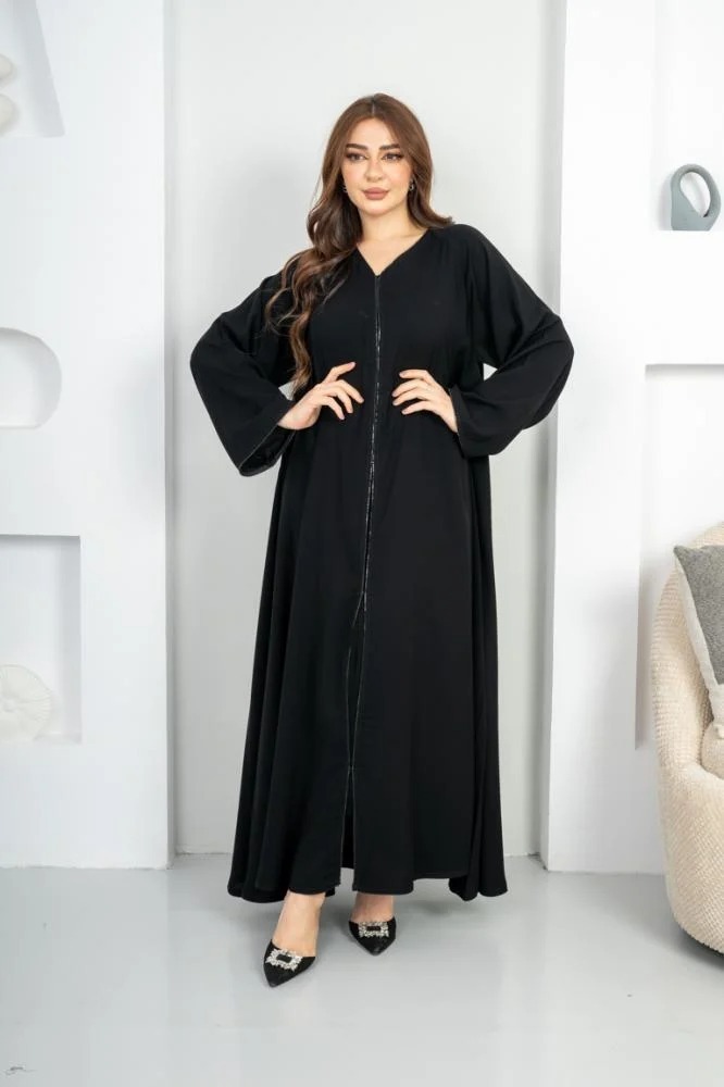 Elegant flared abaya with a decorative belt at the front and on the sleeve