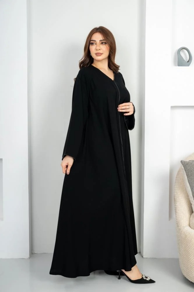 Elegant flared abaya with a decorative belt at the front and on the sleeve