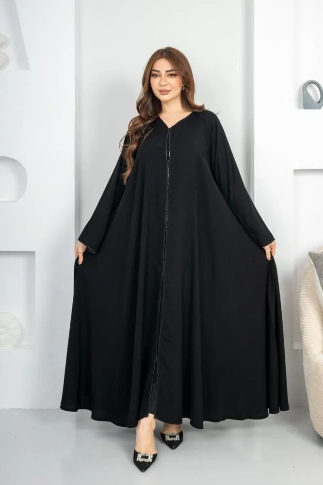 Elegant flared abaya with a decorative belt at the front and on the sleeve