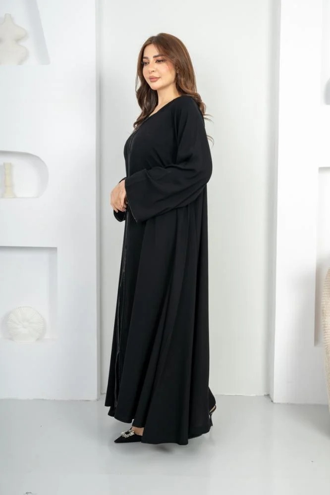 Elegant flared abaya with a decorative belt at the front and on the sleeve