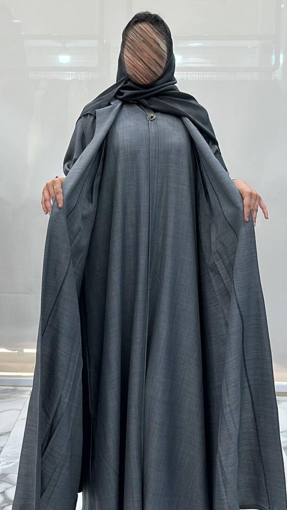 Al-Jazi abaya with a flared cut made of linen fabric, set with a dress