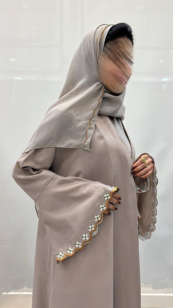 Names Abaya colorful and embroidered with the edges and the headscarf
