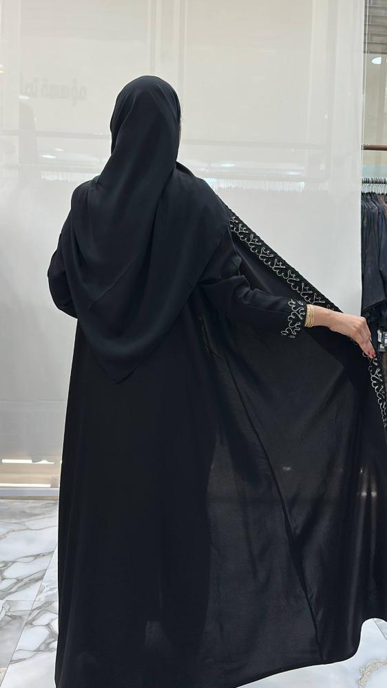 عباية روضه كلوش بقماش اندنوسي سواد فاحم وتطريز حياكه