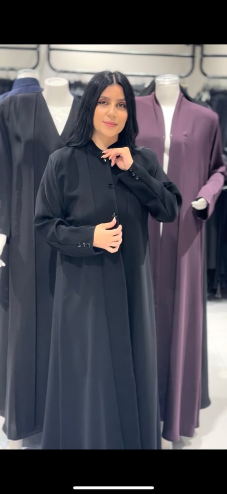 Abaya made of blazer fabric with crystals on the front and sleeves... black color