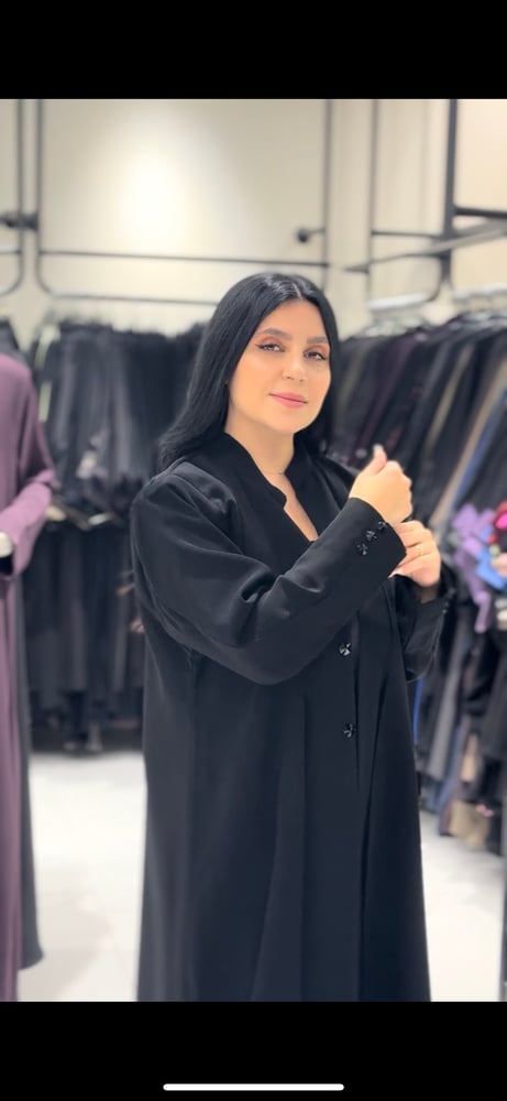 Abaya made of blazer fabric with crystals on the front and sleeves... black color