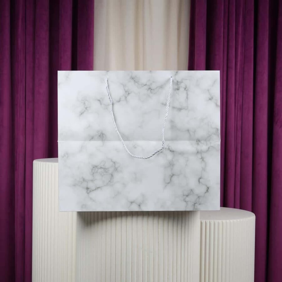Large white ceramic carrier bags