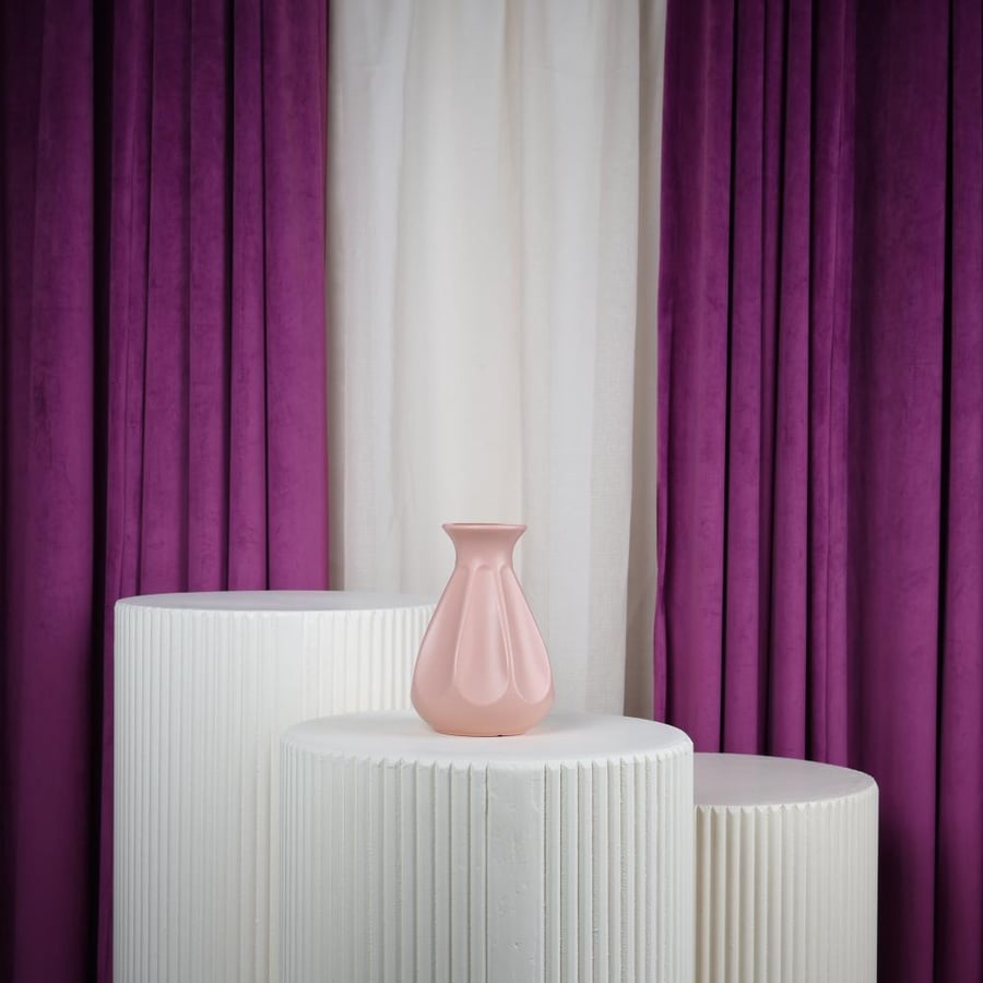 pink plastic flower vase