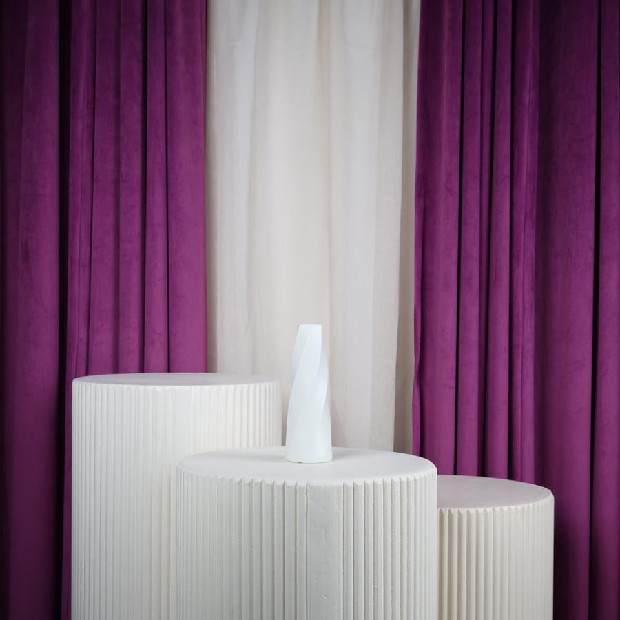 white plastic flower vase