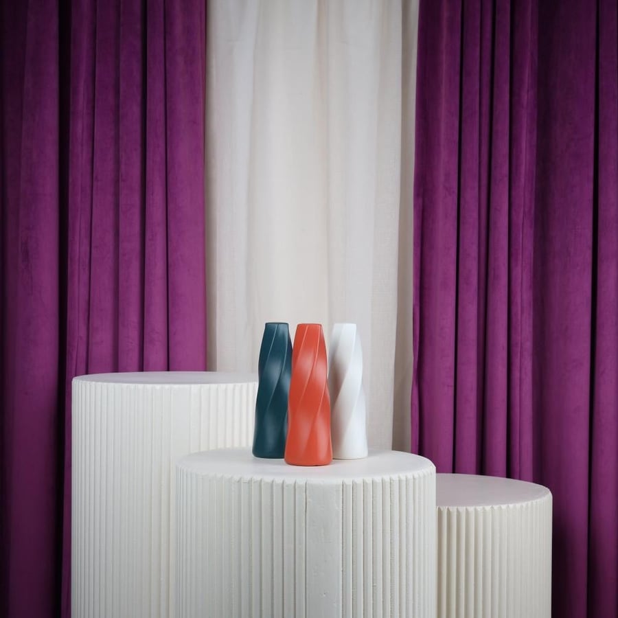 white plastic flower vase