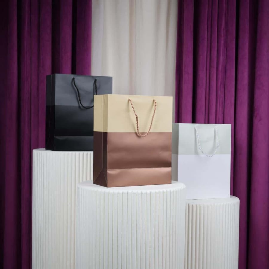 Black and gray rectangular carrier bags
