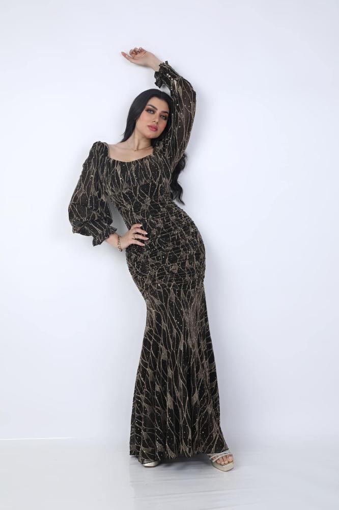 فستان سهرة طويل مزموم