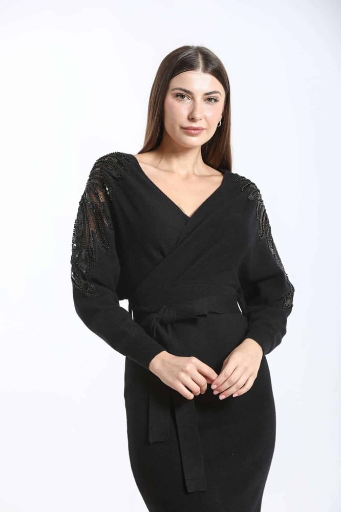Midi dress decorated from the shoulder