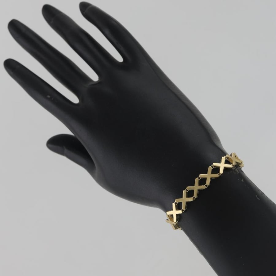 Gold bracelet with X design with matte parts - 18 karat