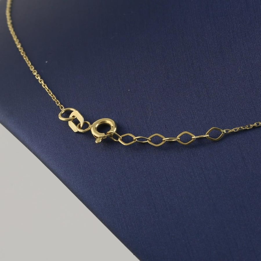 Gold ring and heart - 18 karat