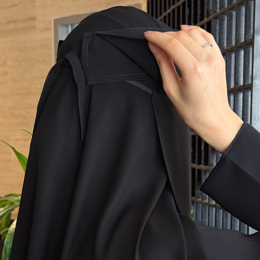 نقاب بمرد عادي وسط ربط