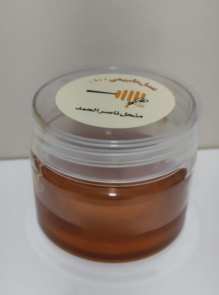عسل أثل ونباتات صيفية خام