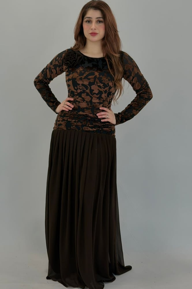 A dress that combines various fabrics and design styles