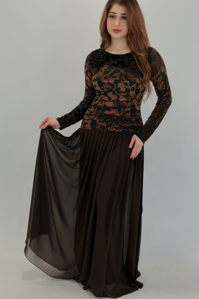 A dress that combines various fabrics and design styles
