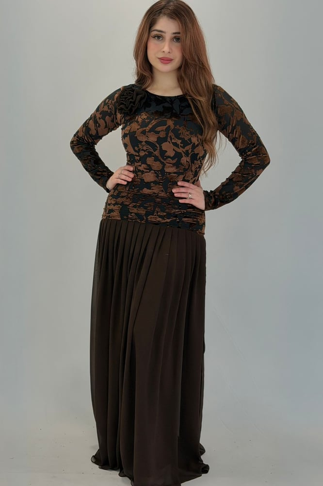 A dress that combines various fabrics and design styles