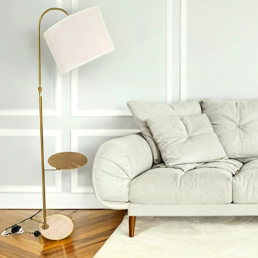 Golden floor lamp with travertine base