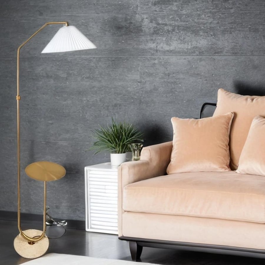 Golden floor lamp with travertine base table