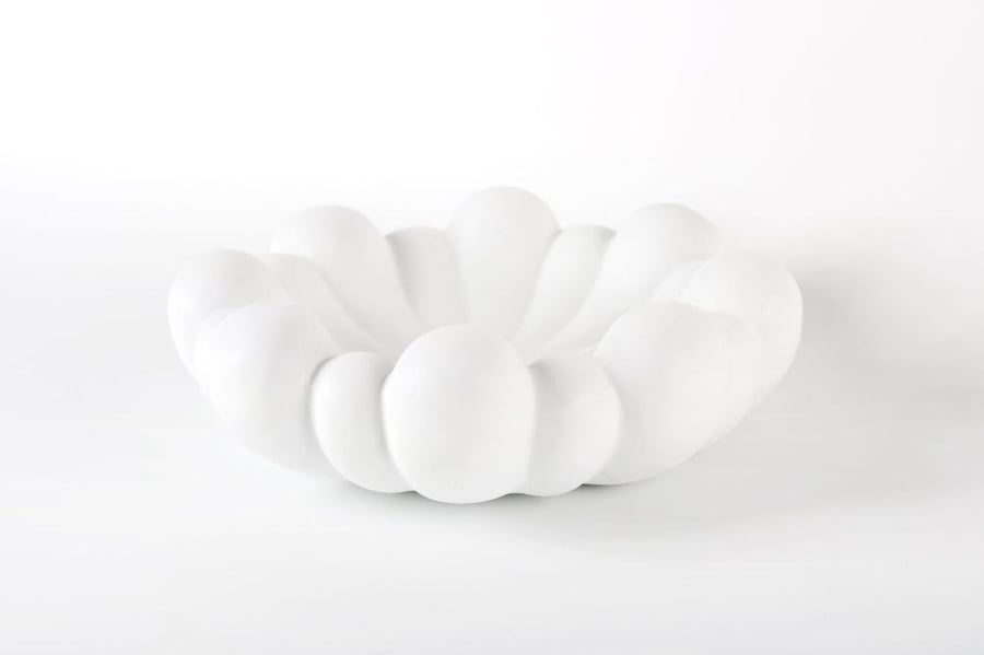 Elegant white plate for serving sweets and dates