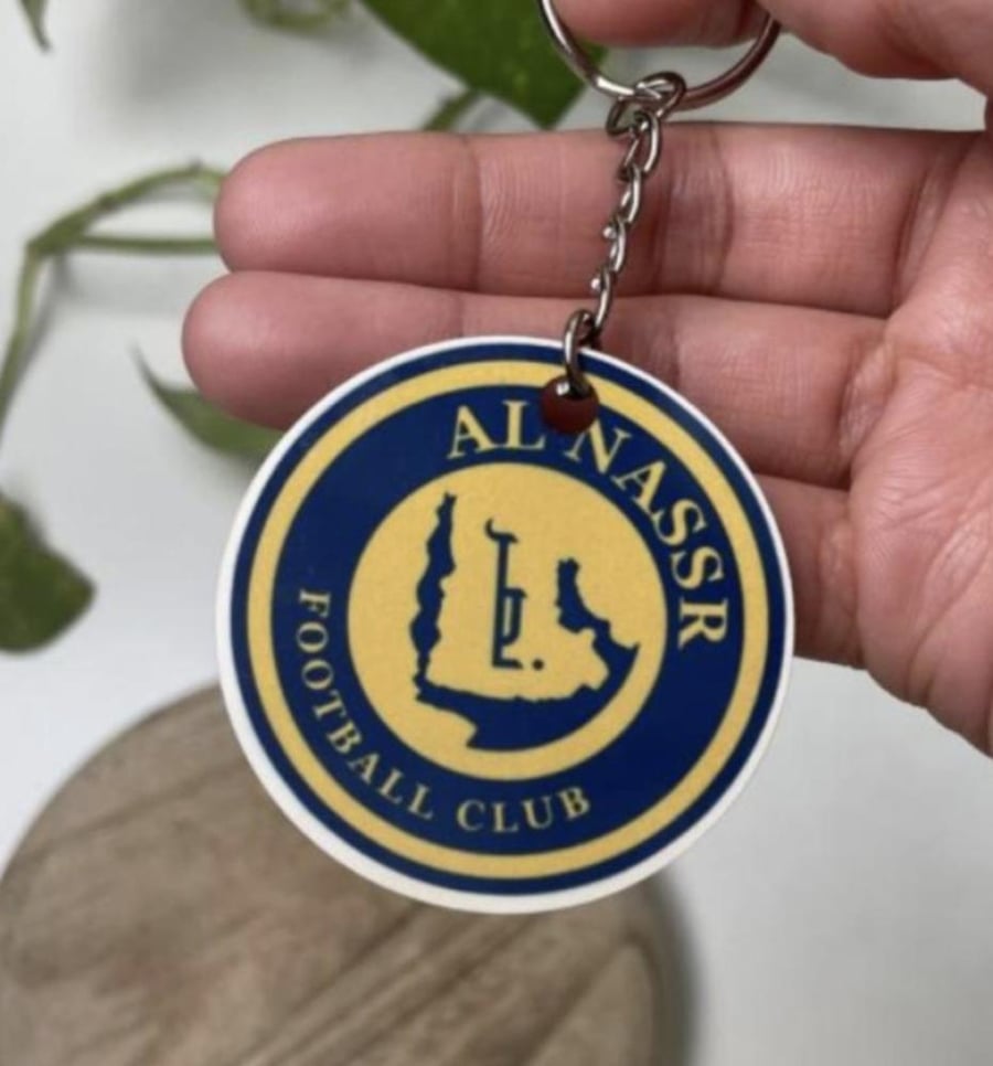 ميدالية نادي النصر الأكريليك الدائرية الفاخرة