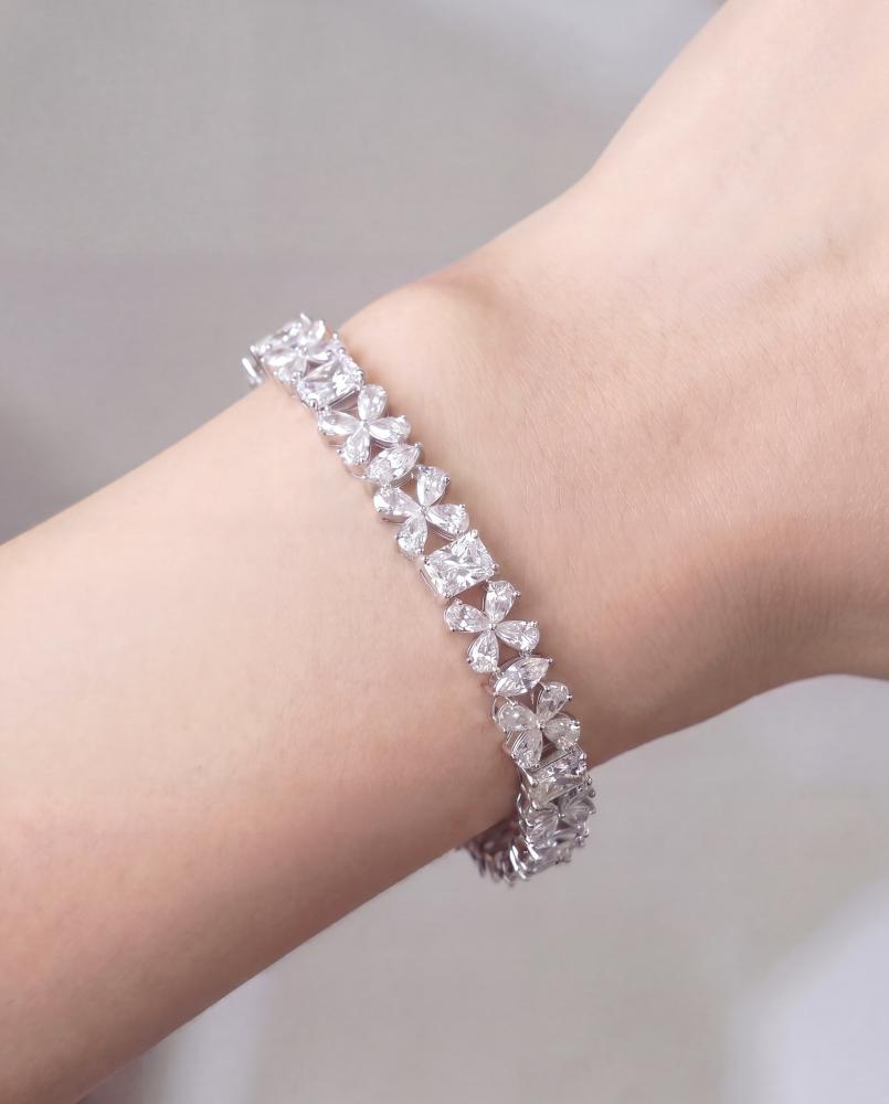 Bracelet, roses, and white squares