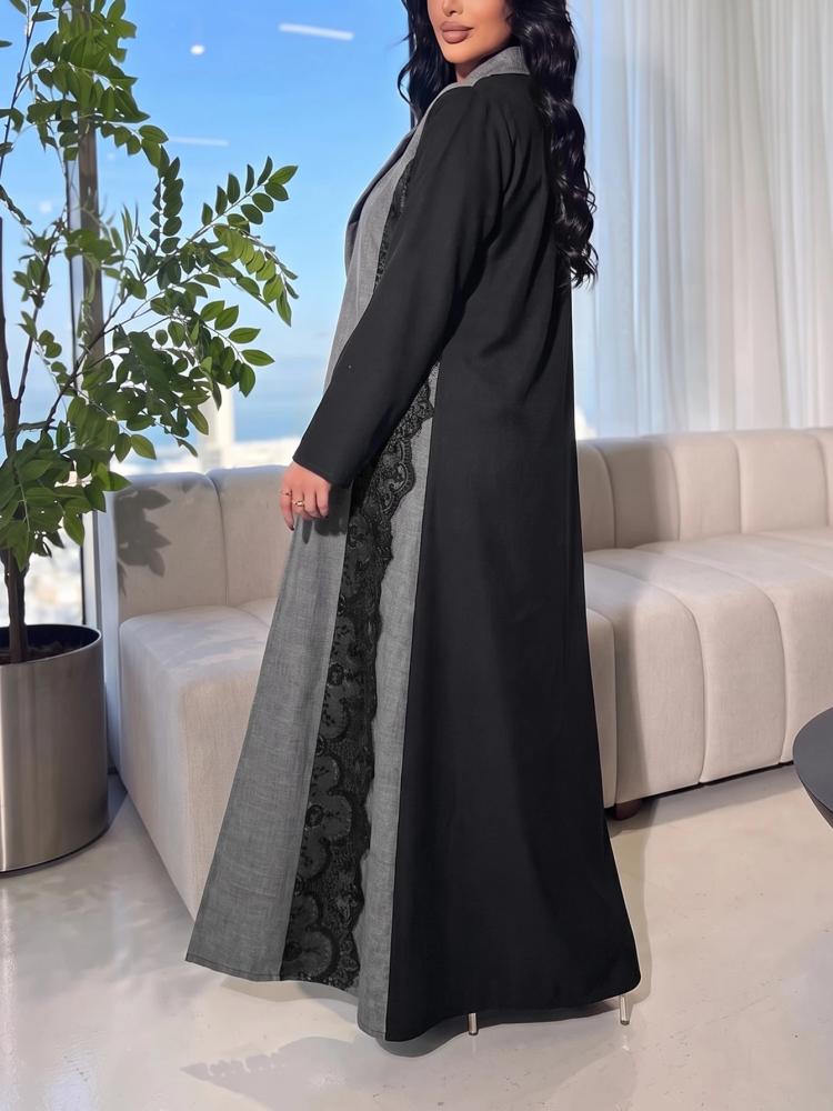 تونيك نسائي واسع مقاس كبير بتصميم ثنائي اللون وتطريز جانبي أنيق