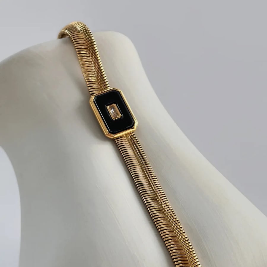 Black square stone gold plated steel bracelet