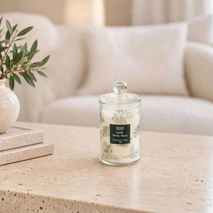 شمع معطر برائحة التفاح والمسك الابيض
