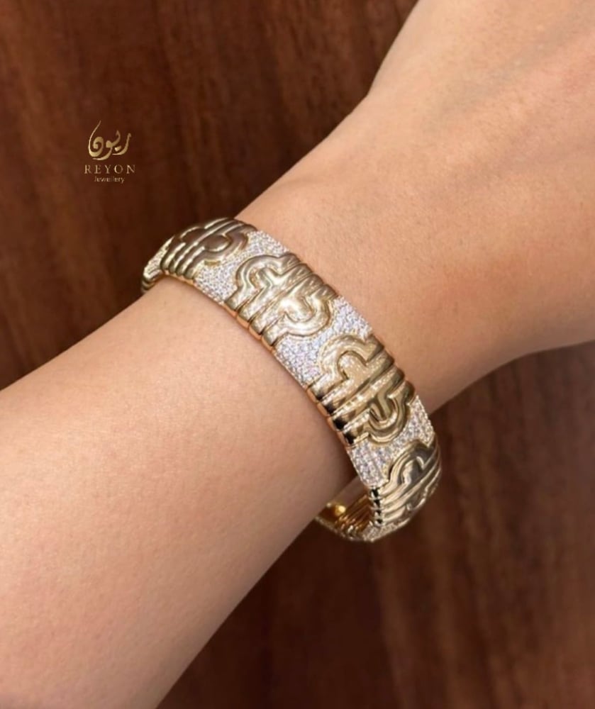 اسواره فضه مرصعه بالزيركون اليويسري مطليه ذهب روز قولد مقاس 17cm