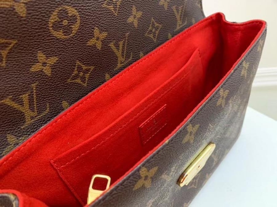 لويس فيتونا Louise Vuitton