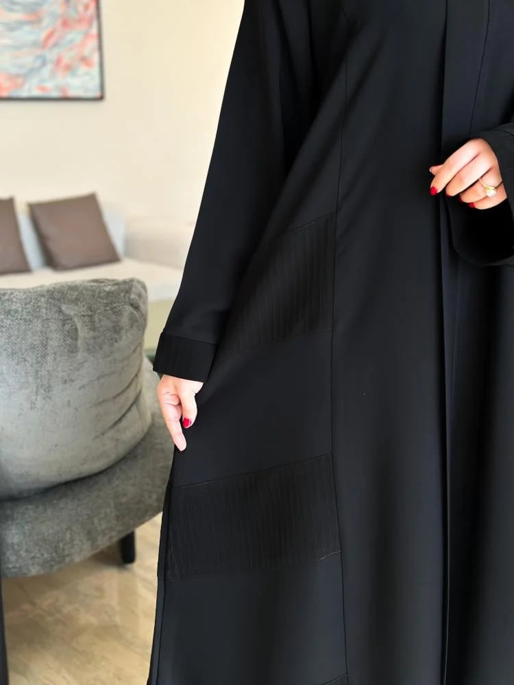 عبايه 121مع نقاب وطرحه مجاناً