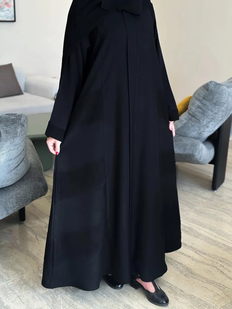عبايه 121مع نقاب وطرحه مجاناً