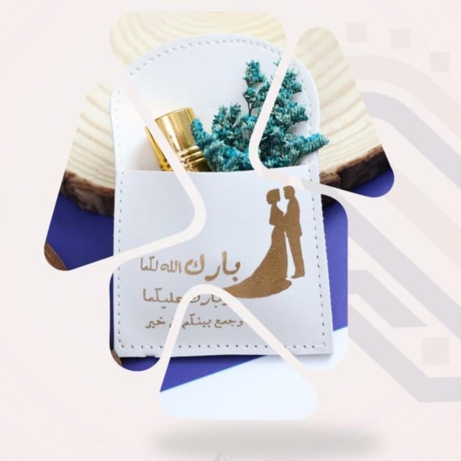 مجموعه(١٢) جيوب جلد مع ربع توله عطر ورد
