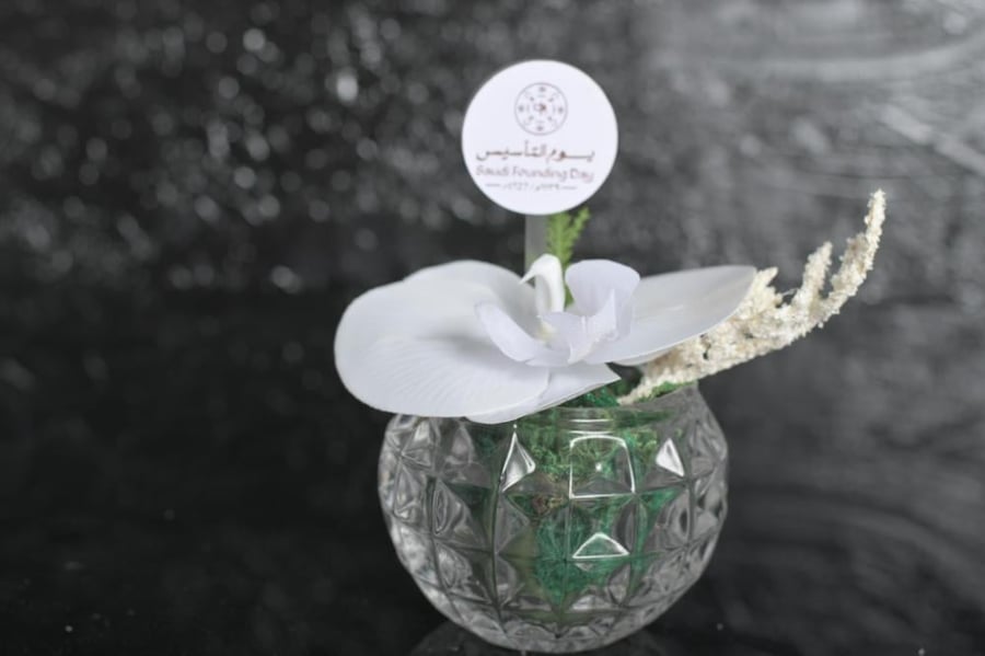 Set of (12) vase arrangements according to the request