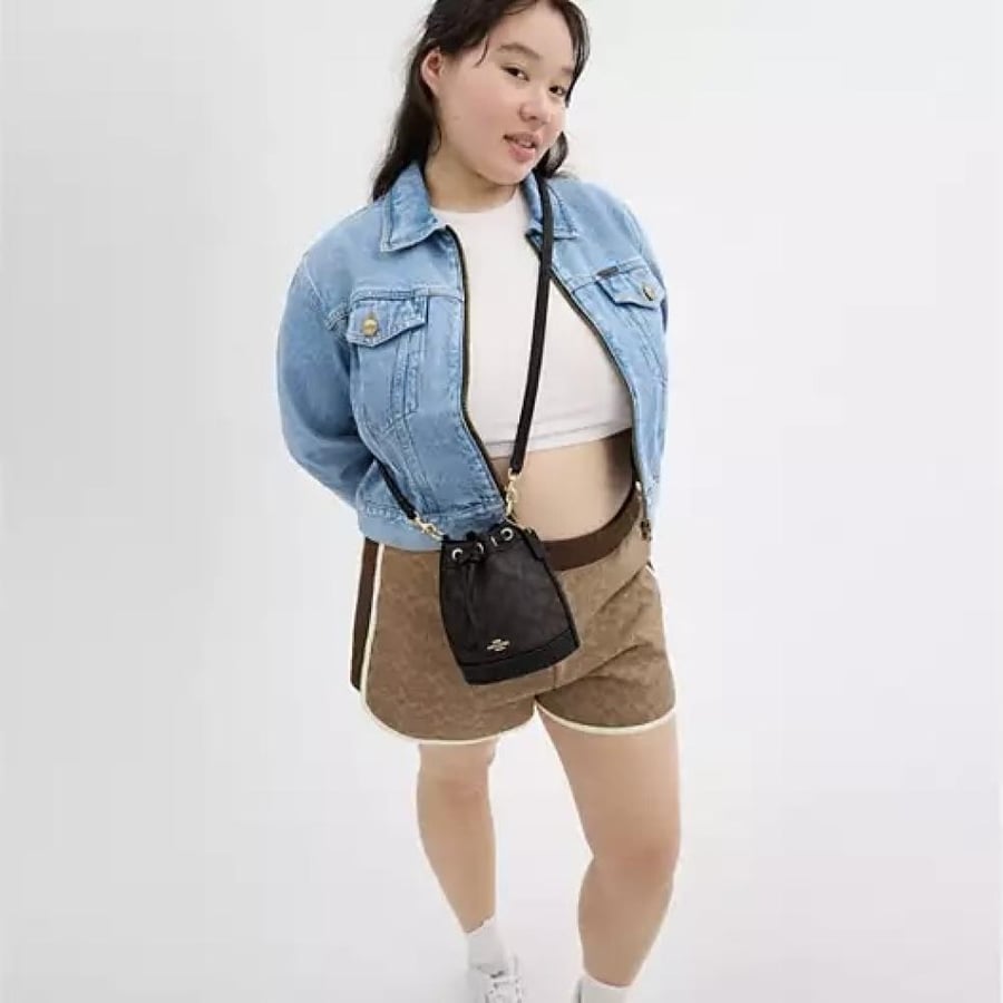Mini Bucket Bag In Signature Canvas
