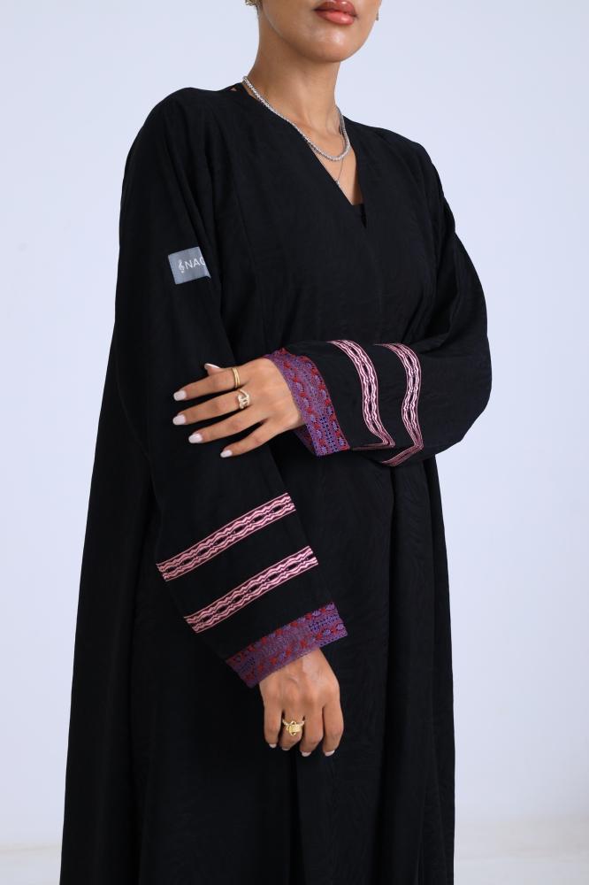 Silk abaya washed with a soft and flowing cut