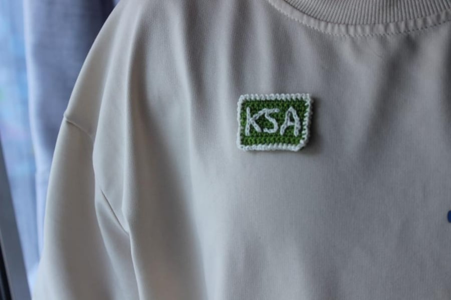 Crochet brooch "KSA" national