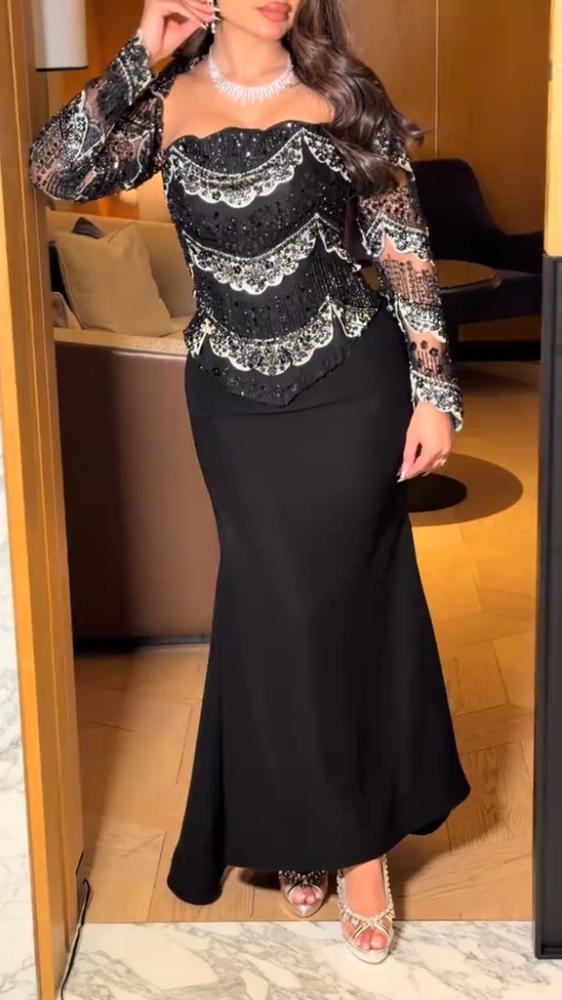 فستان سهرة أسود ملكي بتطريز خرز فاخر وقماش باربي ناعم