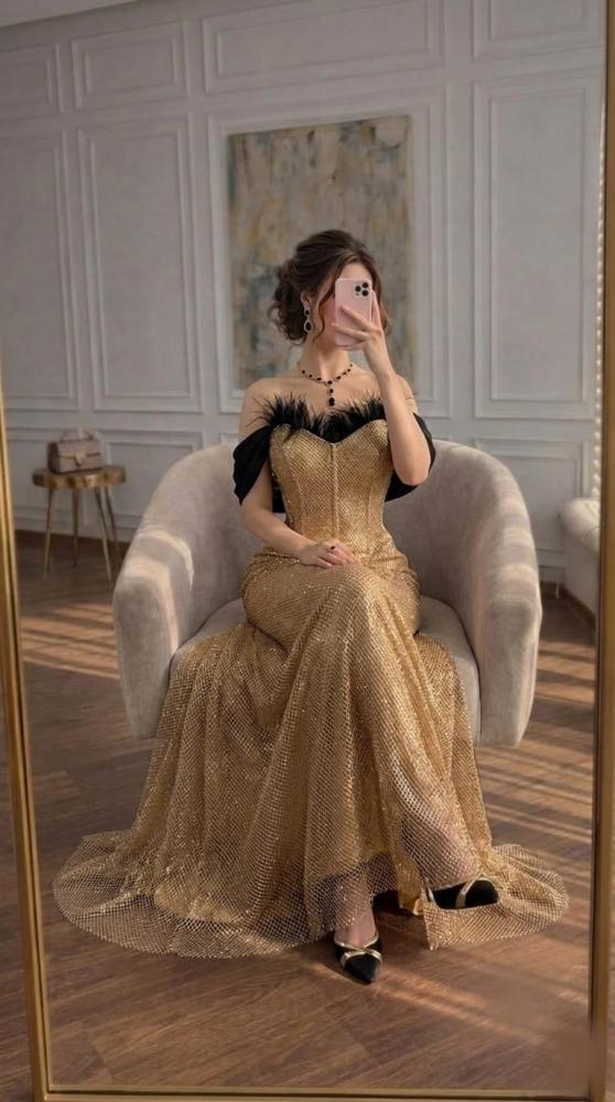 فستان سهرة ذهبي فاخر من الشبك المرصع بفصوص الزركون