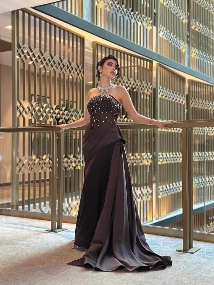 Women's evening dress made of Barbie fabric and luxurious taffeta with an elegant design and shiny decorations - multiple sizes available