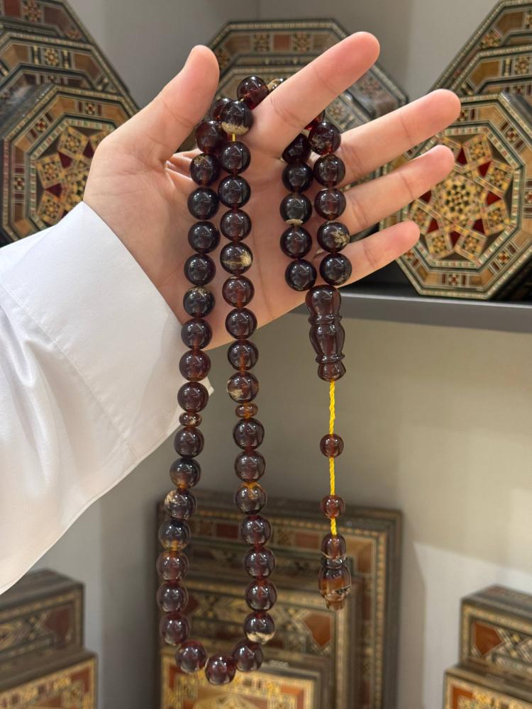 مسبحة كهرم طبيعي سومطري كروي - حجر السلطان ولك من الاسم نصيب